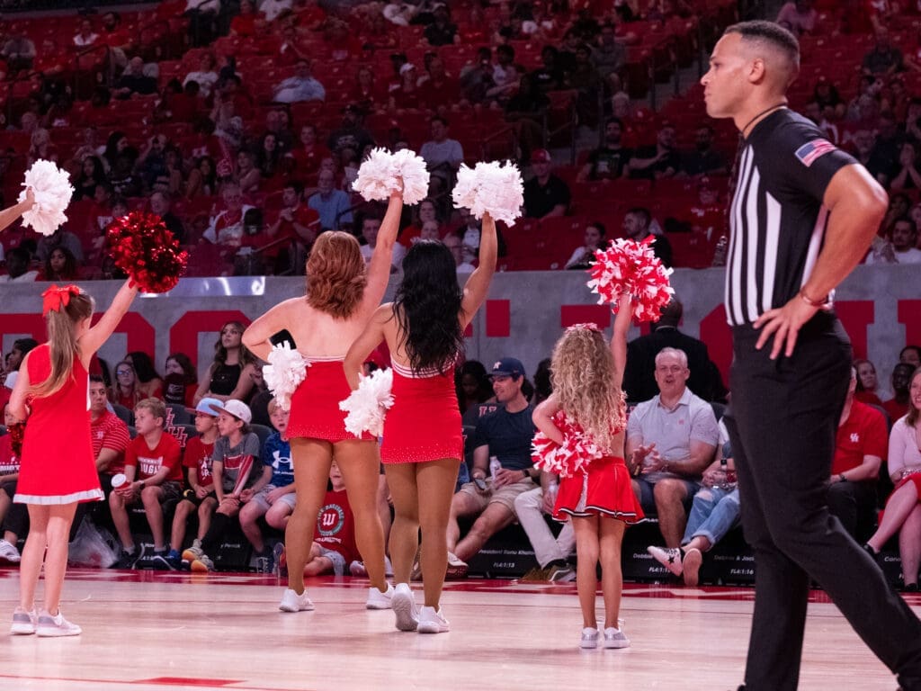 University of Houston's cheerleaders bring some youngsters into the mix. (Photo by F. Carter Smith)