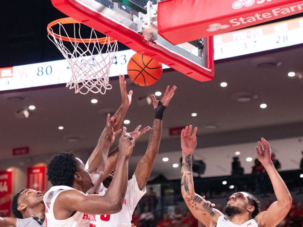 Rebounding is a group effort for UH coach Kelvin Sampson's team. (Photo by F. Carter Smith)