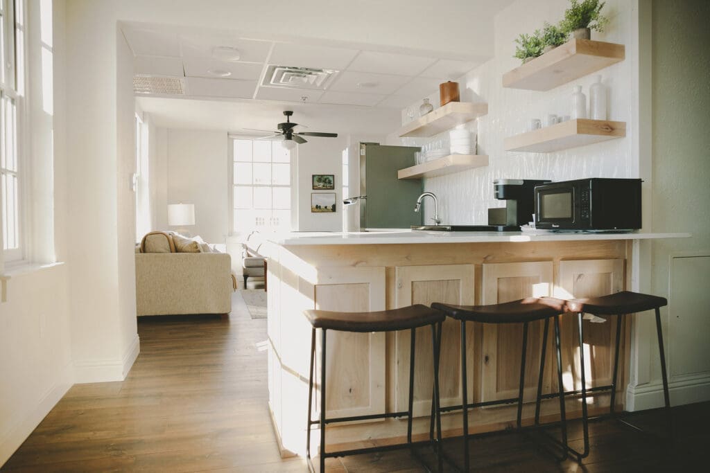 Crazy - Water Hotel rooms include full kitchens and modern amenities.