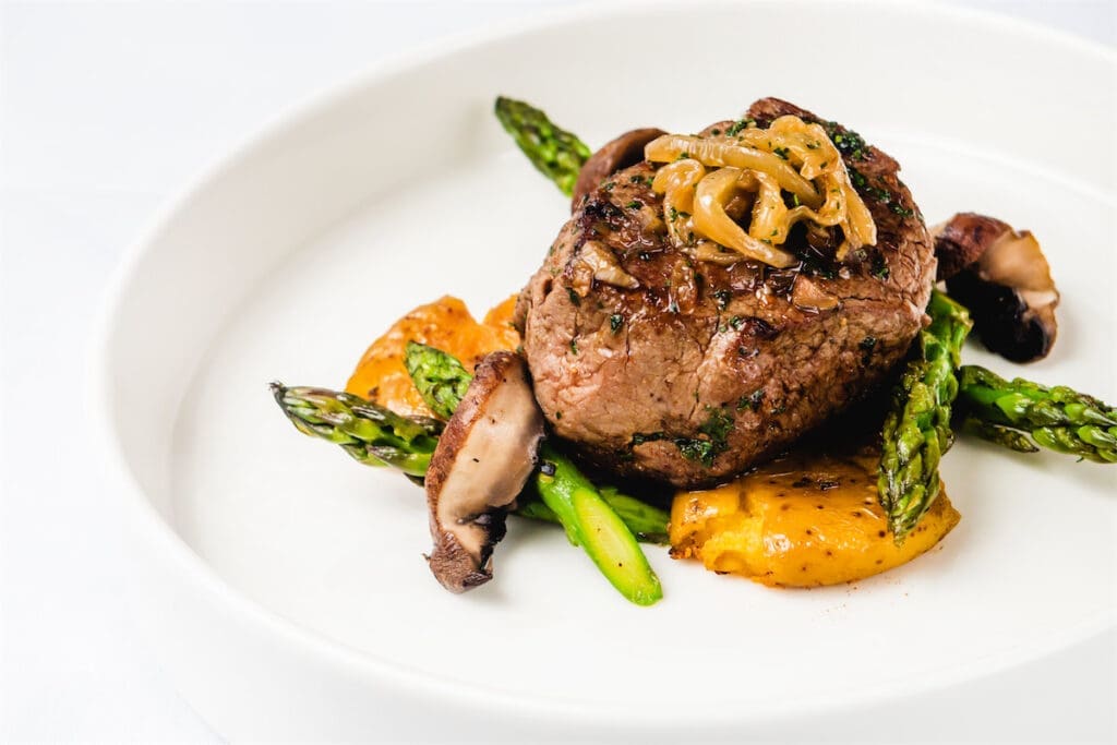 Onboard amenities include delicious cuisine.