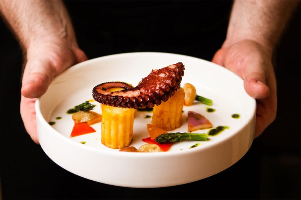 Onboard amenities include delicious cuisine.