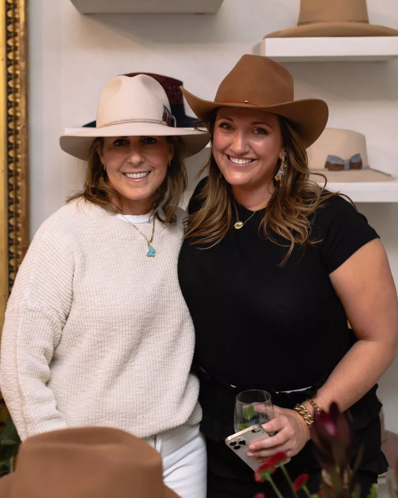 Karen Sachar, Madison Herington at the grand opening fête for Sixteen Ten where Freya hats and Mirth caftans share boutique space. (Photo by Alex Wu)