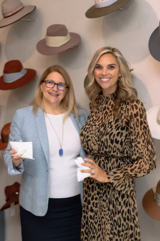 Kim Adams, Kristen Smith at the grand opening fête for Sixteen Ten where Freya hats and Mirth caftans share boutique space. (Photo by Alex Wu)