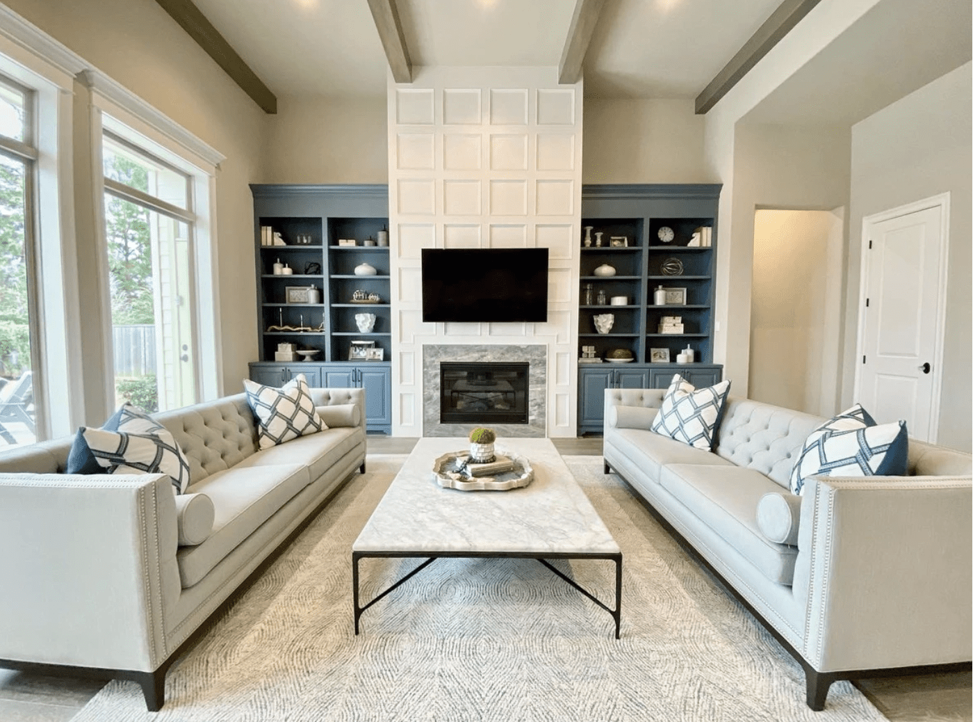 Beautiful built-ins pop with a spot of color amid textured neutrals is part of Woodlands Style Hose's work. (Photo by Nicole Omam)
