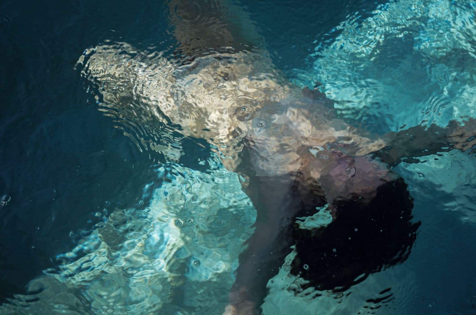 <em>Untitled</em>, 2019 is a standout piece. The ripples in the water and the play of light and shadow appears almost like stained glass. The largest piece in the exhibition at 40 x 60 inches demands close viewing.
