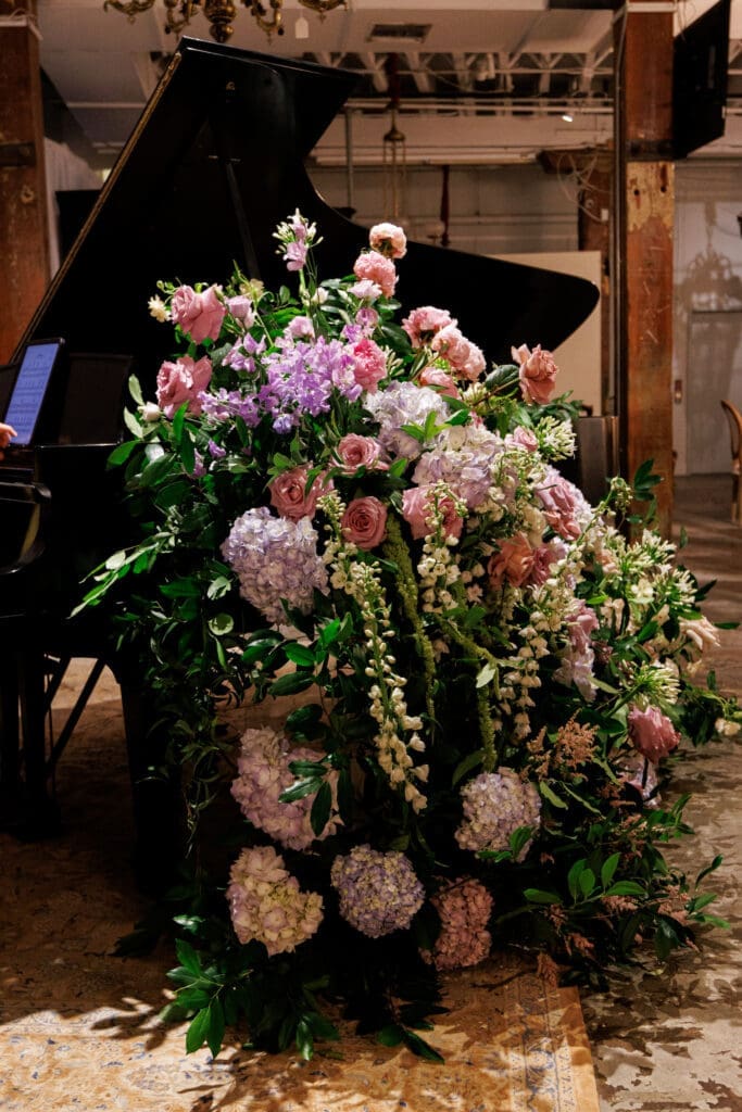 Massive arrangements by Sara Perez Ekianger of Antigua Florals accented the elegance of the Versailles-inspired evening at NOAG.