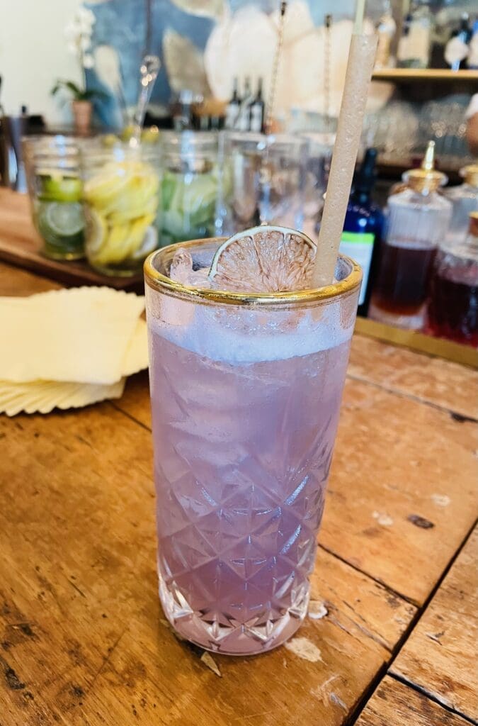 Ellerbe's new cocktail called Rif Ram Bah Zoo gets its color from Japanese ube. (Photo by Courtney Dabney)