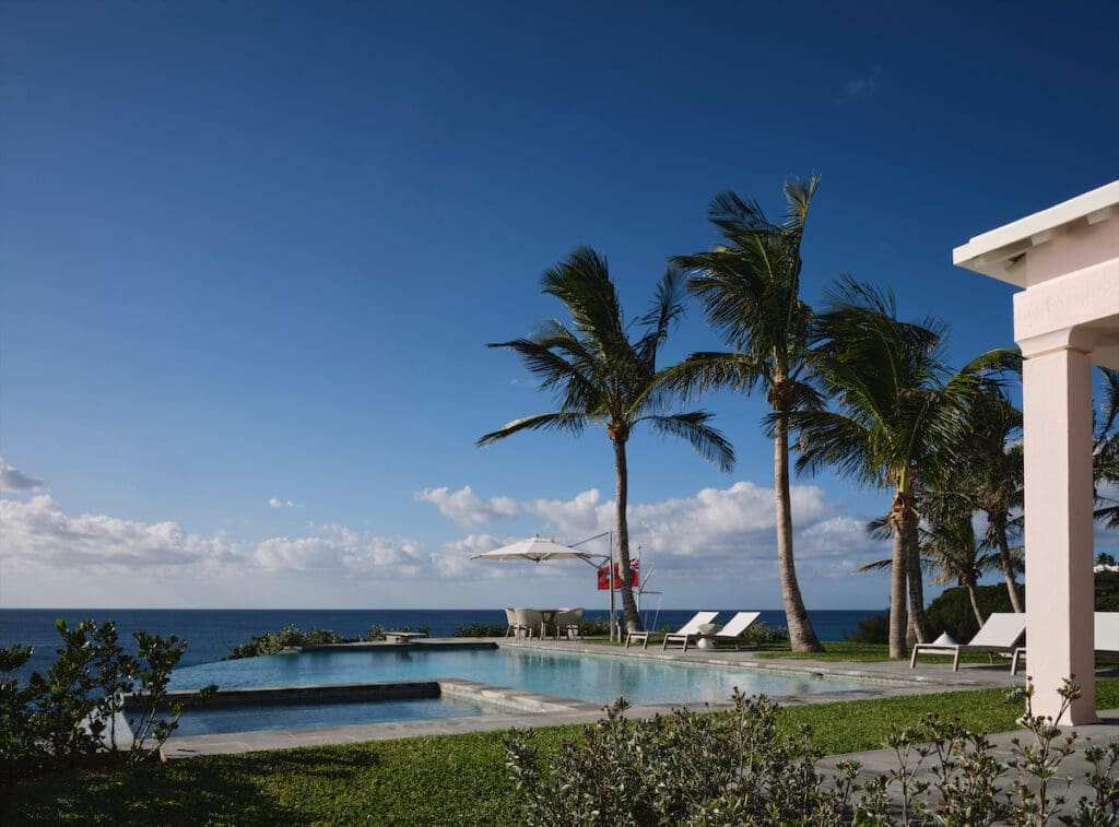 An infinity pool was tailored to the clients’ specifications. Umbrella and lounge chairs from Island Trading Limited. (Photo by Douglas Friedman)