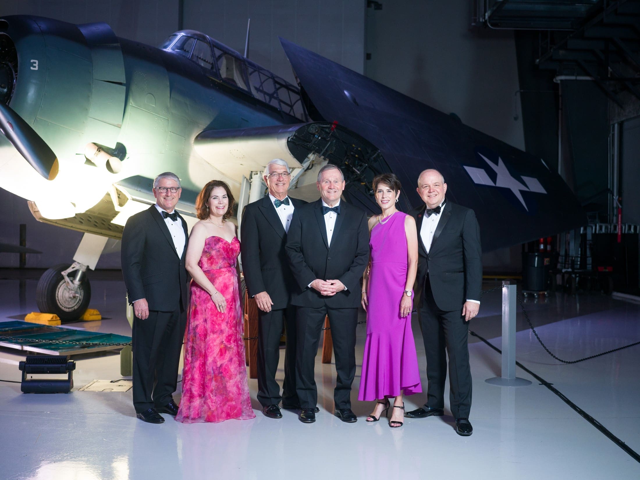 Co-chairs David & Kelly Rose, board chairman Scott Rozzell, president and CEO Doug Owens, co-chairs Megan & Jason Ryan at the Lone Star Flight Museum Jet Setters Ball