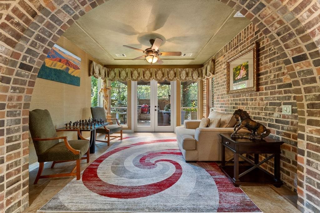 One of the many spaces to enjoy is the sun room, perfect for quiet moments or a game of chess.