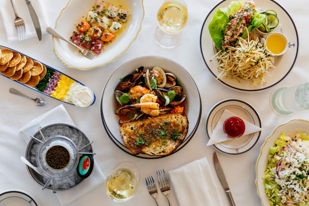 An array of dishes served at the new Clark's Houston. The newly minted restaurant comes from Austin-based MML Hospitality, comprised of restaurateurs Larry McGuire, Tom Moorman, and hotelier Liz Lambert. (Photo by Justin Book)