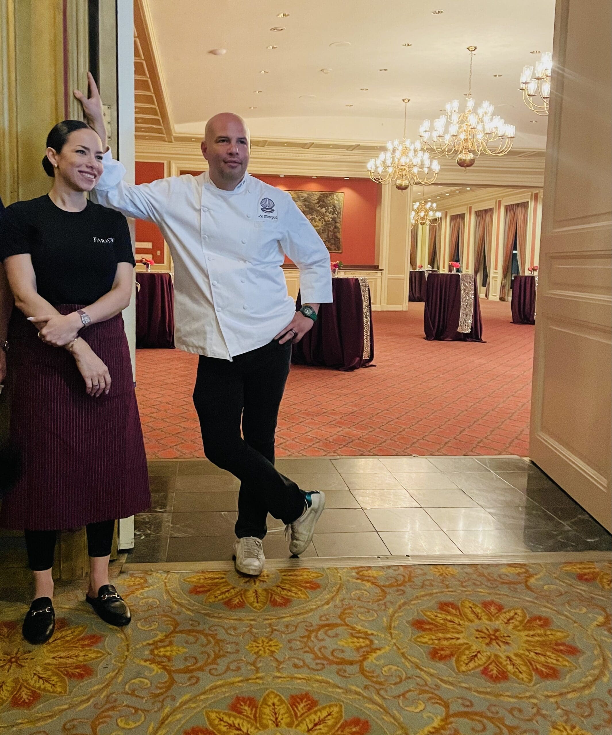 Chef Felipe Armenta with Sous Chef Sophia looking on as lucky attendees eat. (Photo by Courtney Dabney)