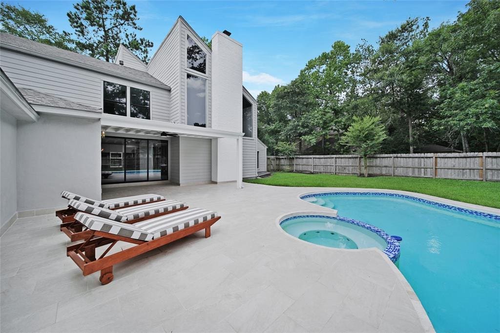 4 Greenridge Drive has a contemporary pool and a backyard space with plenty of room for personalization. 