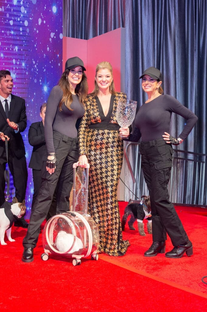 Chairs Jody Merritt and Christine Johnson flank Angela Hernandez and her prize winning bunny, Buckley, at the Citizens for Animal Protection Celebrity Paws Gala (Photo by Jacob Power)