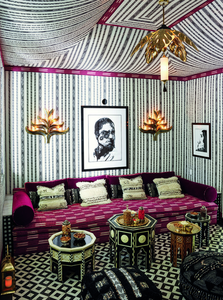In Martyn Lawrence Bullard's home, a screening room with Moorish tables from his own line and vintage Italian plum leaf wall sconces from Guinevere Antiques London. (Photo by Douglas Friedman)