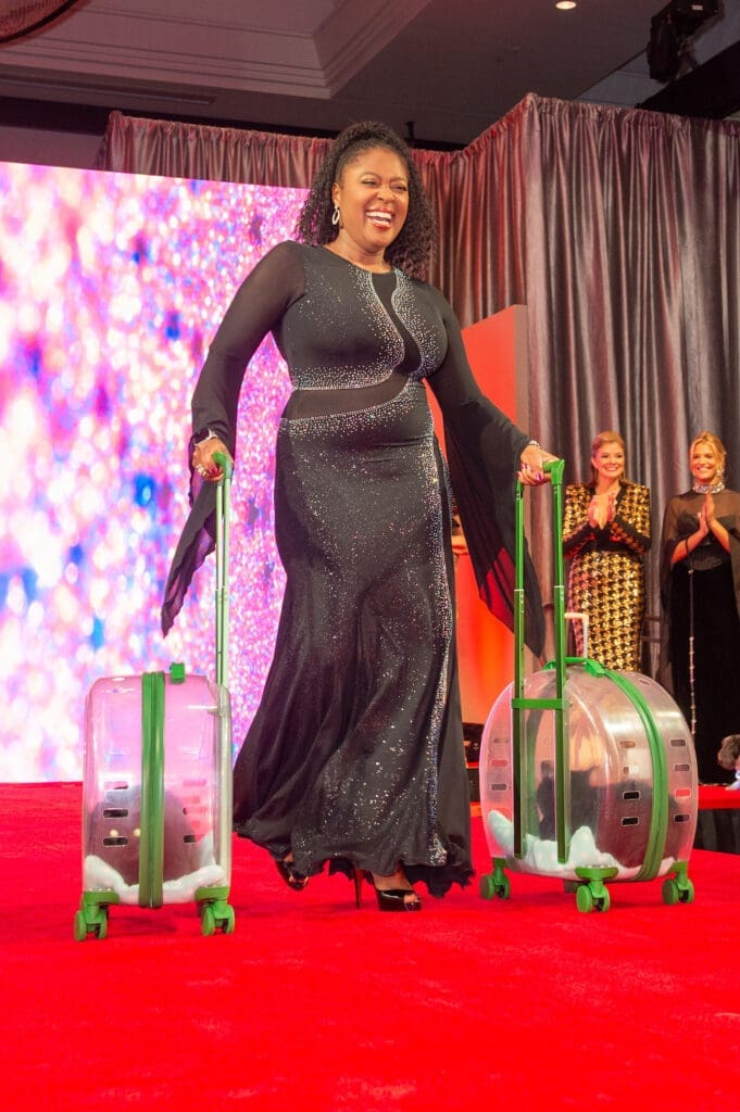 Sharron Melton with Omorede and Idrissa at the Citizens for Animal Protection Celebrity Paws Gala (Photo by Jacob Power)
