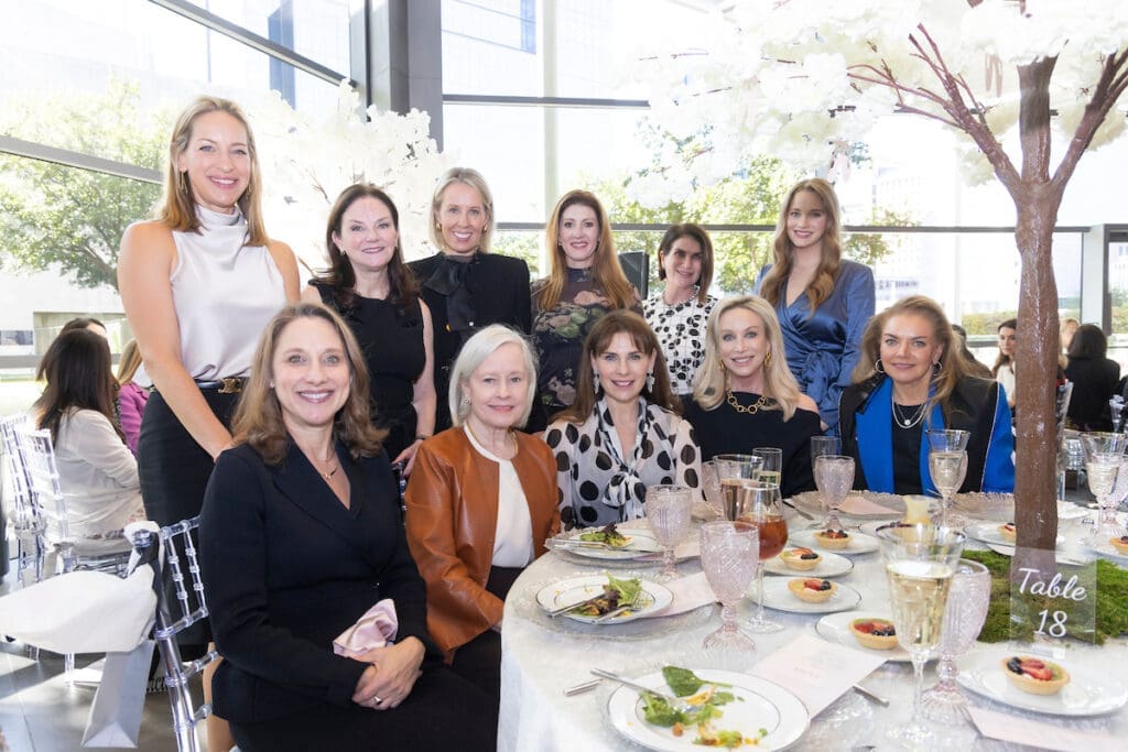 Standing from left to right: Buffy Wehner, Tiffany Jones, Courtney Love, Megan Kleinman, Linda Silver, Averie Gibbins. 
Seated from left to right: Seated, L-R: Vanessa Logan, Anne T. Bass, Nikki Webb, Kim Hext, Ashley Anderson Smith
 (Photo by Sharon Ellman)