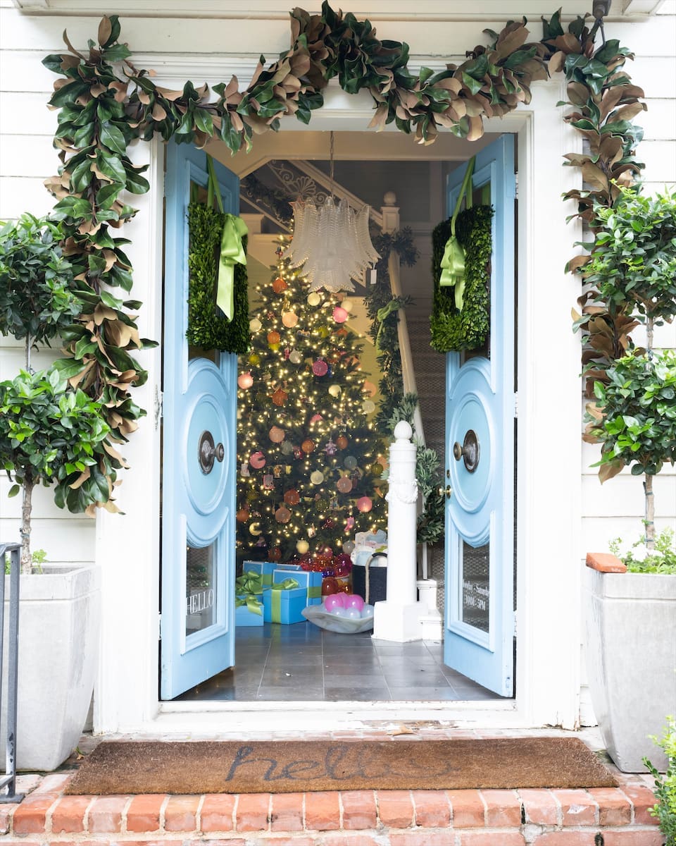 224 Blue Print’s signature blue doors decorated for the holidays