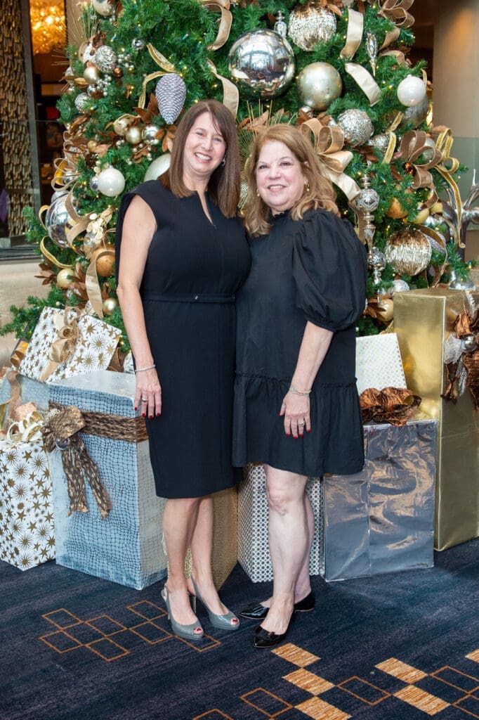 Honoree Joy Posoli and Child Advocates CEO Sonya Galvan at the Angels of Hope Luncheon. (Photo by Jacob Power)