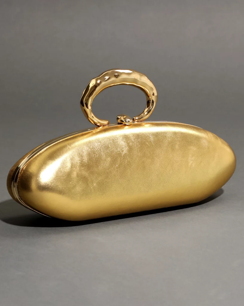 Molten Gold Bullet Minaudiere by Alexis Bittar is sculptural to say the least.