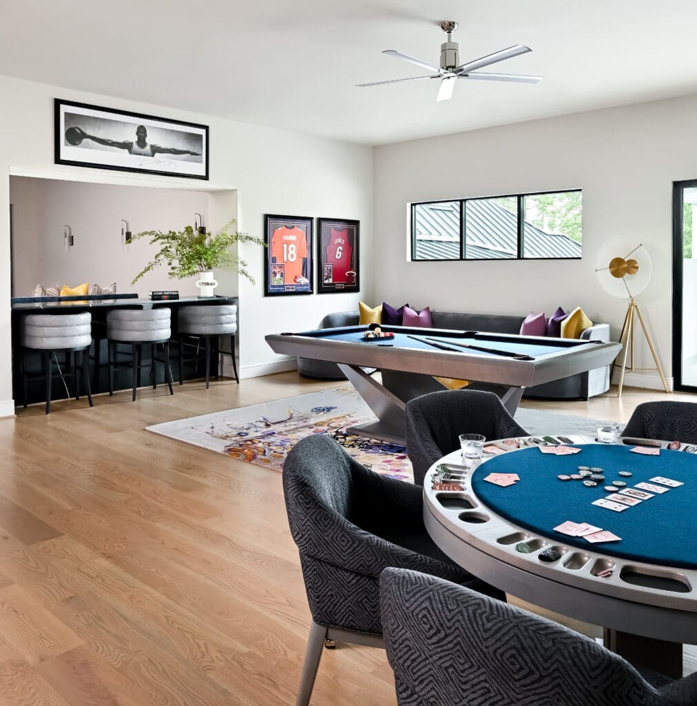 A true game room, with pool and poker tables, brings some fun to this Carlton Woods mansion.
