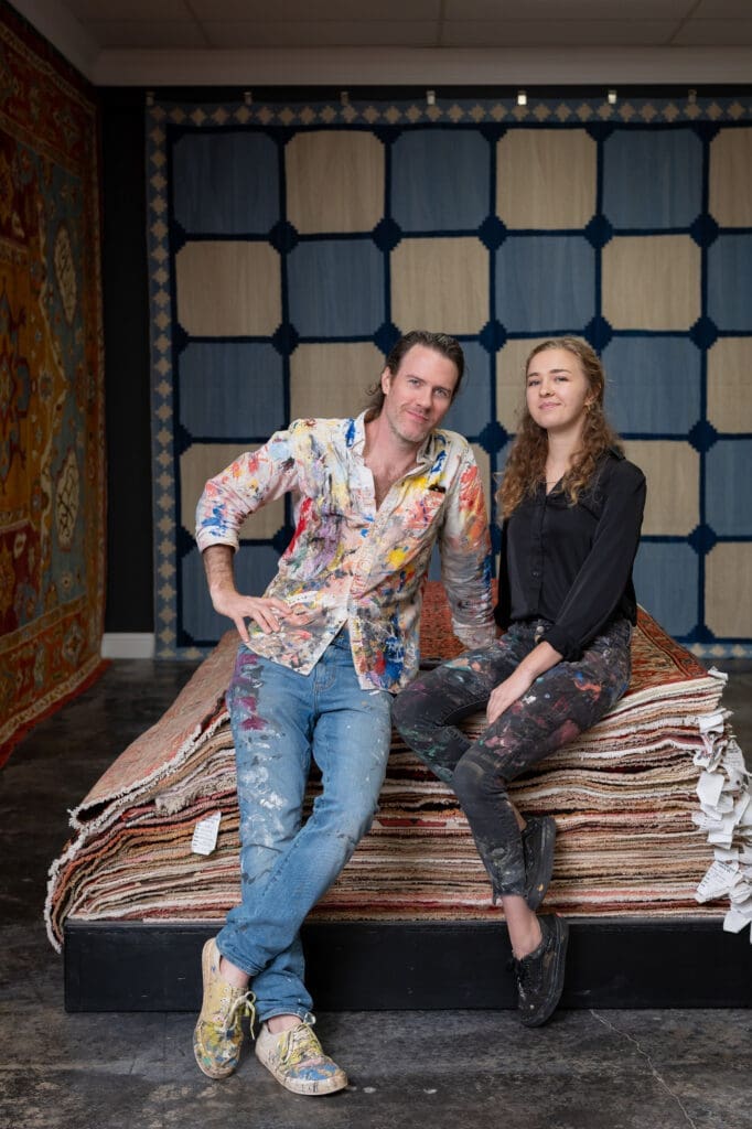 Artists and wreath designers Chris Bachman, Nichole Petrie at the Turkish Rug Company grand opening party benefiting the Salvation Army.