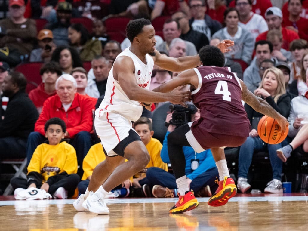 UH guard LJ Cryer took turns guarding Texas A&M star Wade Taylor IV too. (Photo by F. Carter Smith)