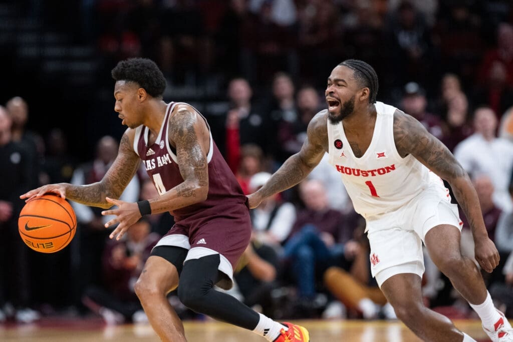Texas A&M guard Wade Taylor IV and Jamal Shead played against each for years and years coming up in Texas and the AAU world. (Photo by F. Carter Smith)