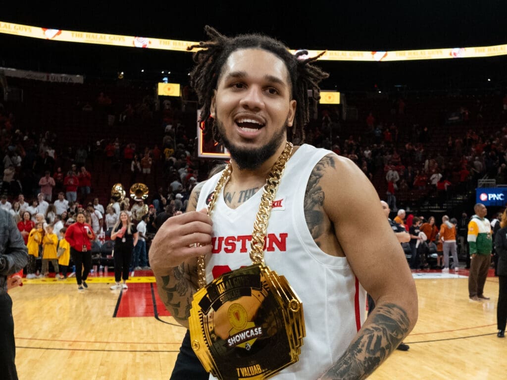 University of Houston guard Emanuel Sharp left with game MVP honors in the Halas Guys Showcase and the zany hardware to match. (Photo by F. Carter Smith)