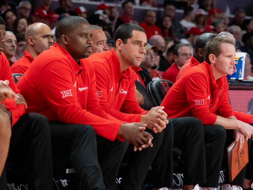 University of Houston assistant coaches Quannas White, Kellen Sampson and K.C. Beard always bring the intensity. (Photo by F. Carter Smith)