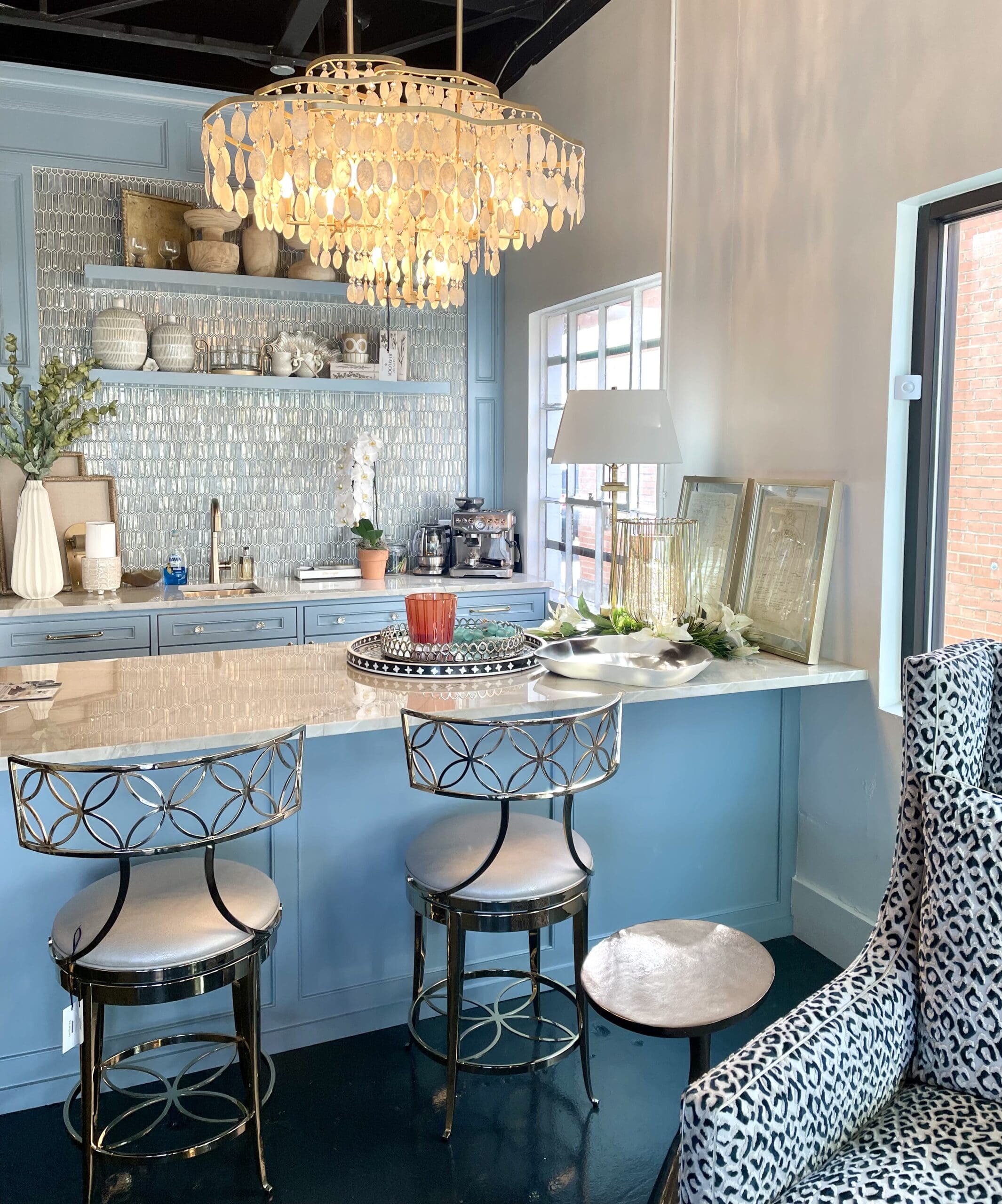 Haus of Blaylock brings seashells, shimmery tile and upholstery.