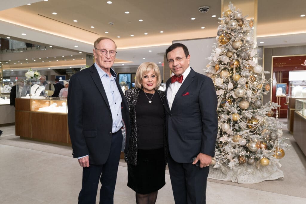 Itzik Berger, Ilana Berger, Dror Zadok at the Zadok holiday party (Photo by Daniel Ortiz)