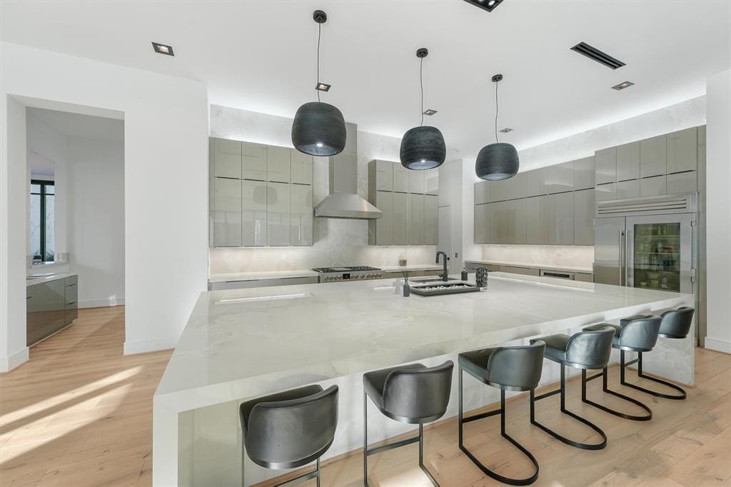 The kitchen in this Woodlands mansion comes with several Italian Fulgor Milano appliances.