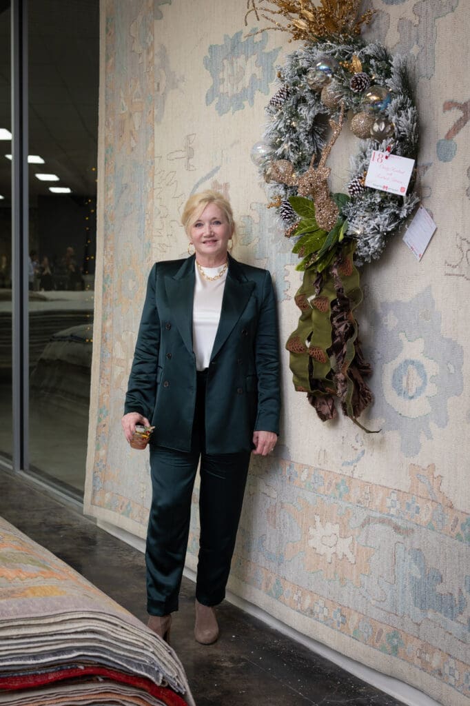 Christi Rowland at the Turkish Rug Company showroom grand opening party benefiting the Salvation Army.
