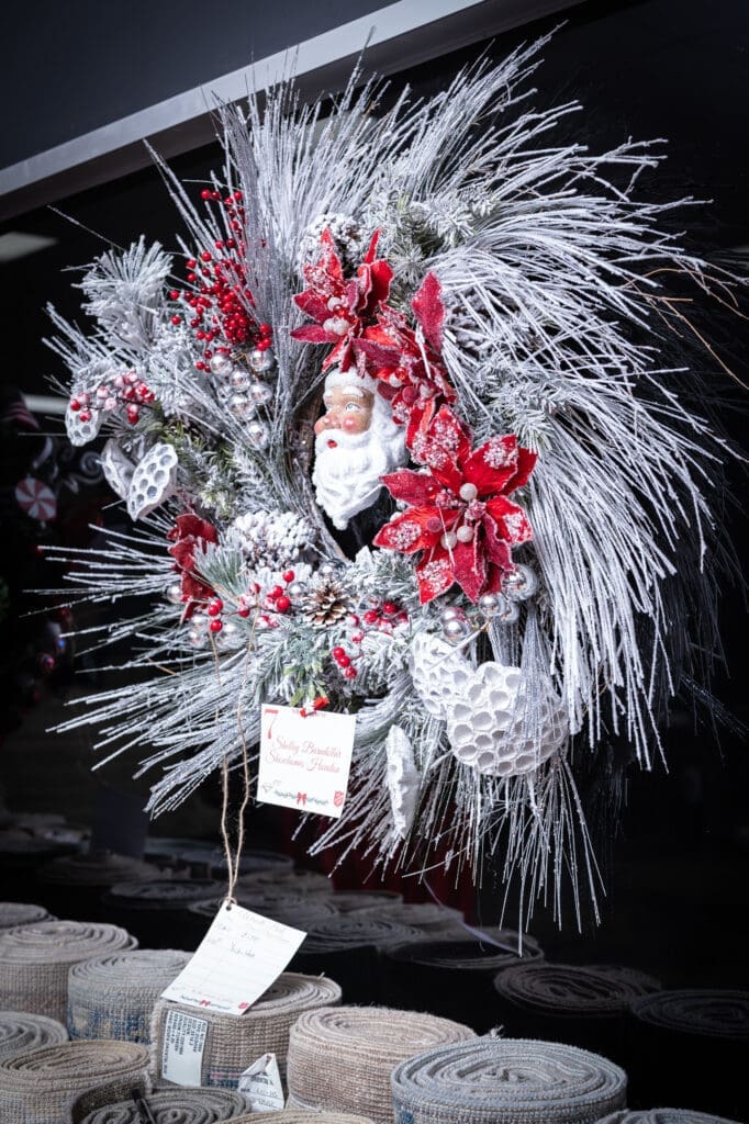One of 18 wreaths up for auction at the Turkish Rug Company showroom grand opening party benefiting the Salvation Army.