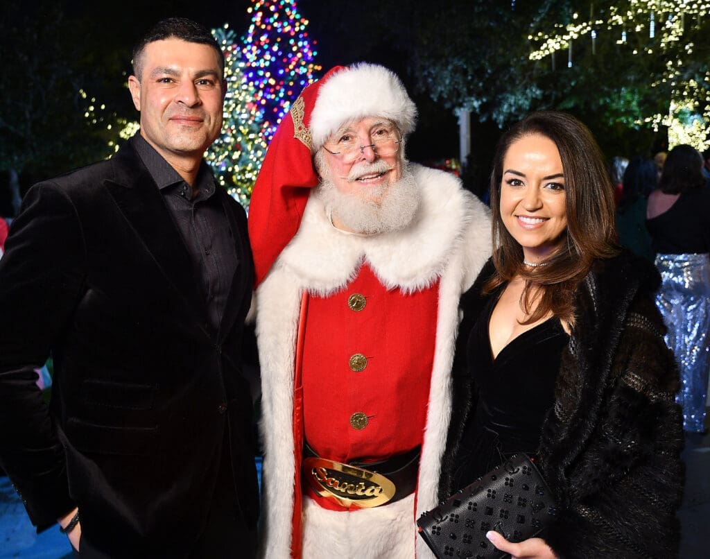 Omar & Maria Alaoui at the MD Anderson Children's Cancer Hospital Santa's Elves fundraiser at the Fertitta family home.