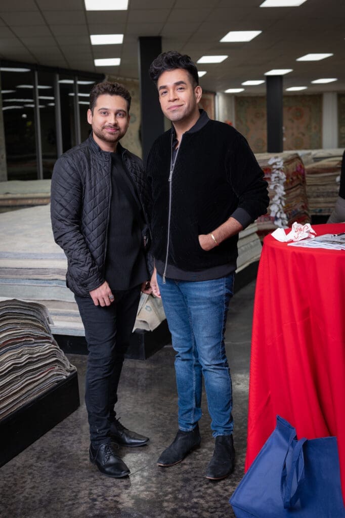 Tristan Erickson, Ruben Salazar at the Turkish Rug Company showroom grand opening party benefiting the Salvation Army.