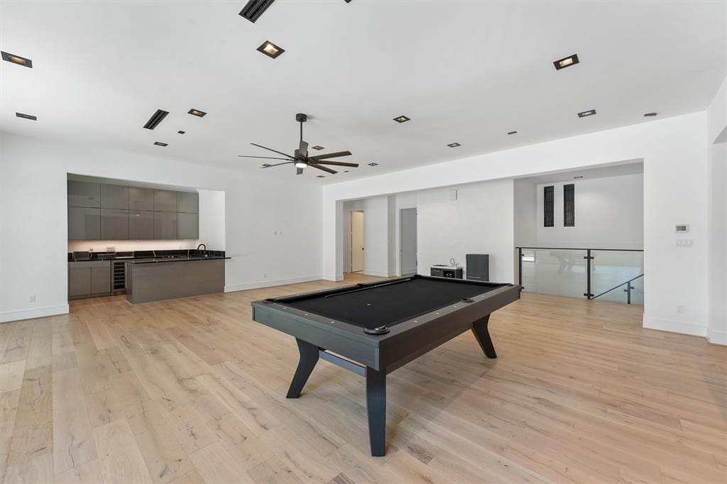 The upstairs bar and game room is a useful space to customize to fit your needs.