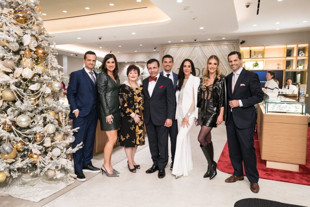 The Zadok Family: Gilad & Lisa Zadok, Helene & Dror Zadok, Segev & Amy Zadok, Michelle & Jonathan Zadok together at the Zadok Jewelers holiday party. (Photo by Daniel Ortiz)