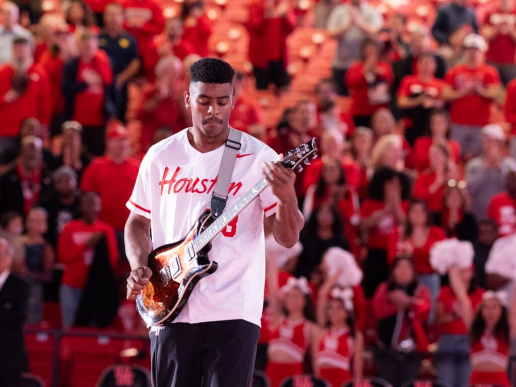University of Houston outfielder Trae Jones did an electric National Anthem before UH basketball's Big 12 opener. (Photo by F. Carter Smith)