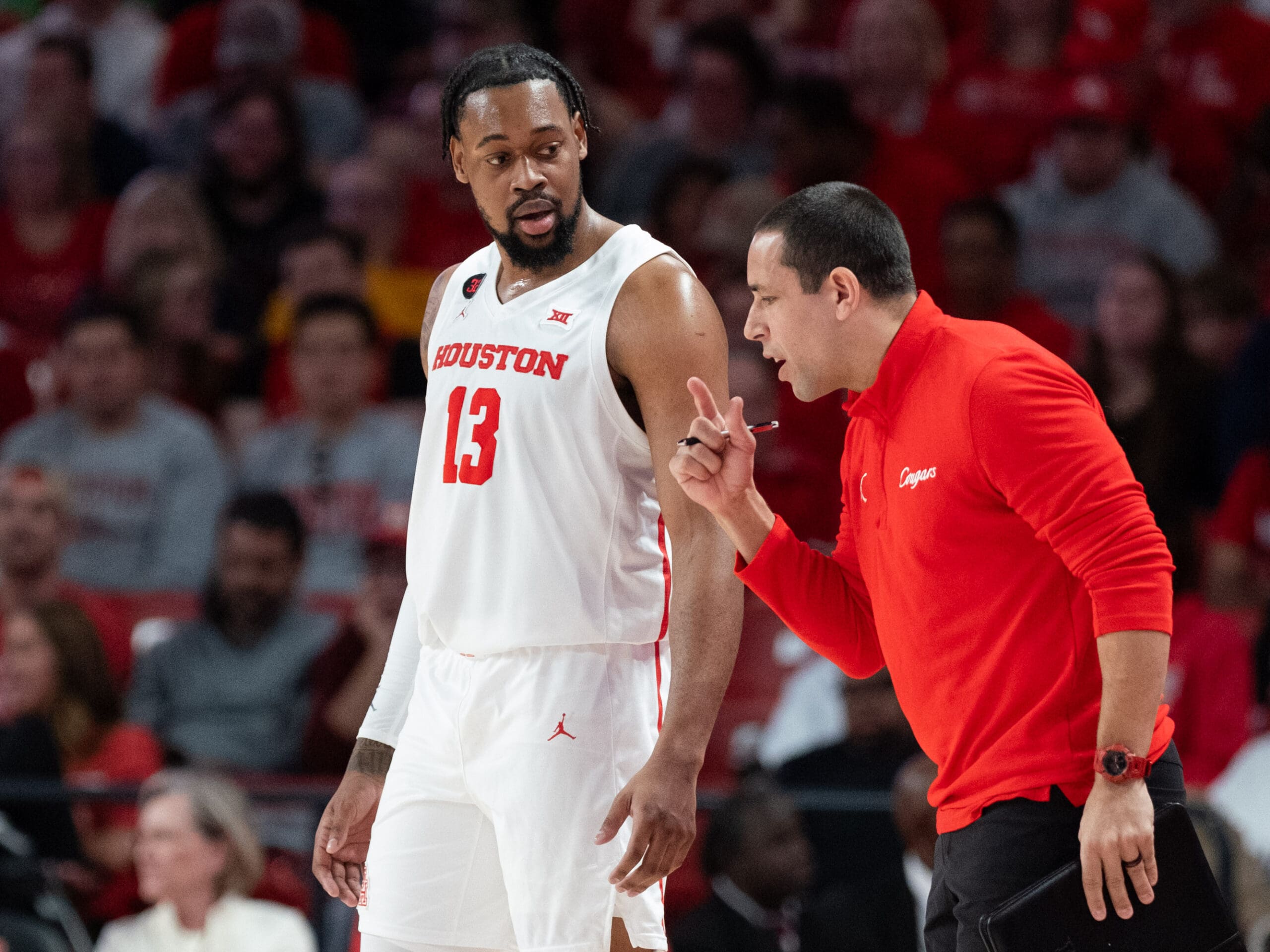 In its first Big XII contest, the University of Houston Cougars beat the University of West Virginia Mountaineers at the Fertitta Center