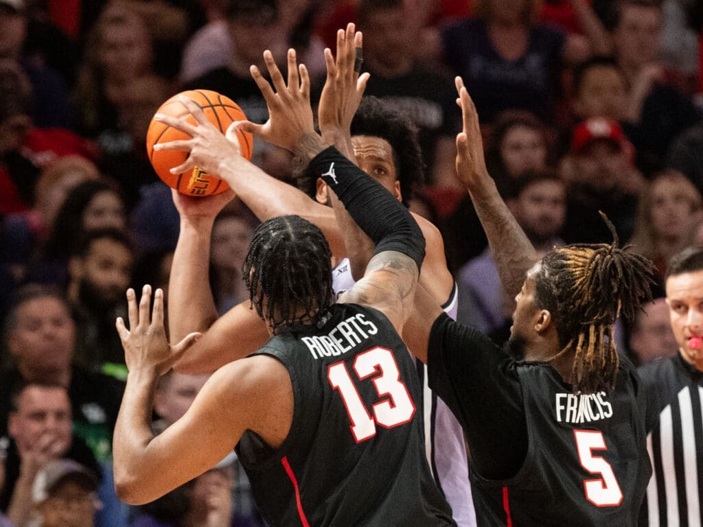 Houston's J'Wan Roberts and Ja'Vier Francis — two of the Wingspan Warriors — have long arms that wreak havoc. (Photo by F. Carter Smith)