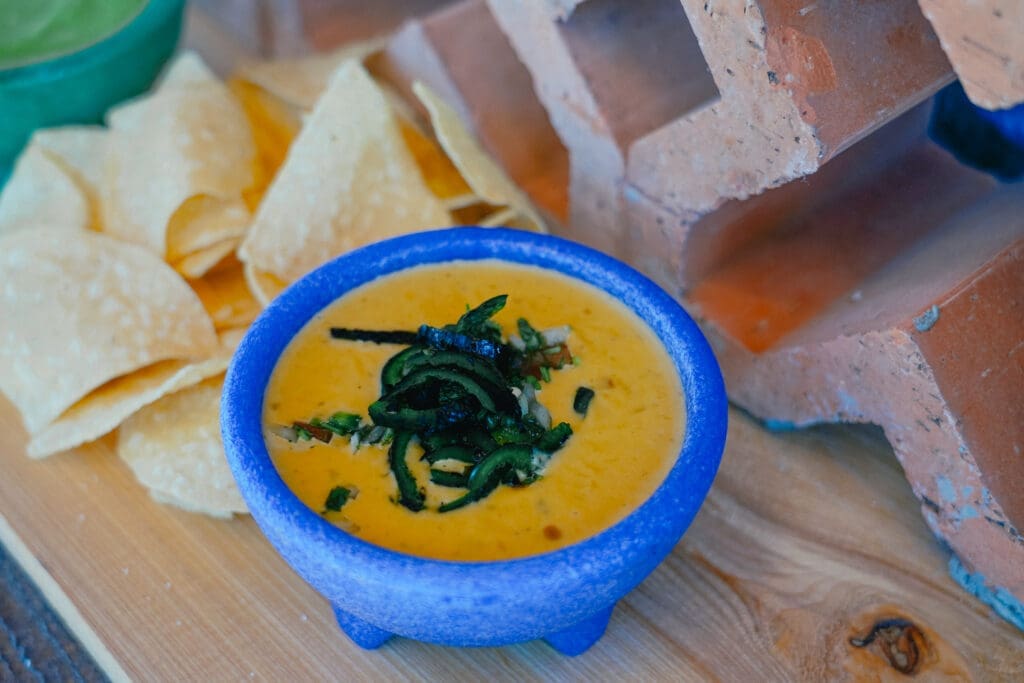 Start with HIWay Cantina's classic chile con queso plain or with the addition of con carne beef, chorizo, or even smoked sausage care of pork kielbasa blended with chargrilled onions and roasted chiles. (Photo by Mikah Danae)