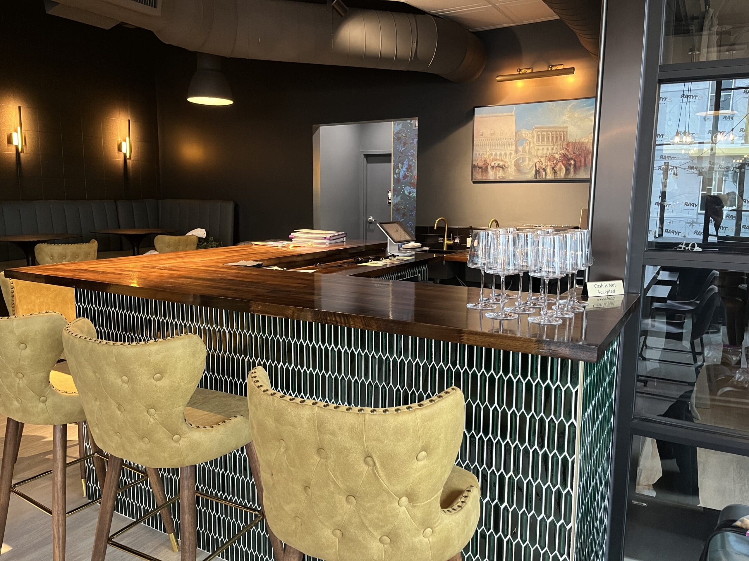 Salute Wine Bar – The brand new bartop inside Salute Wine Bar adds a personal touch.