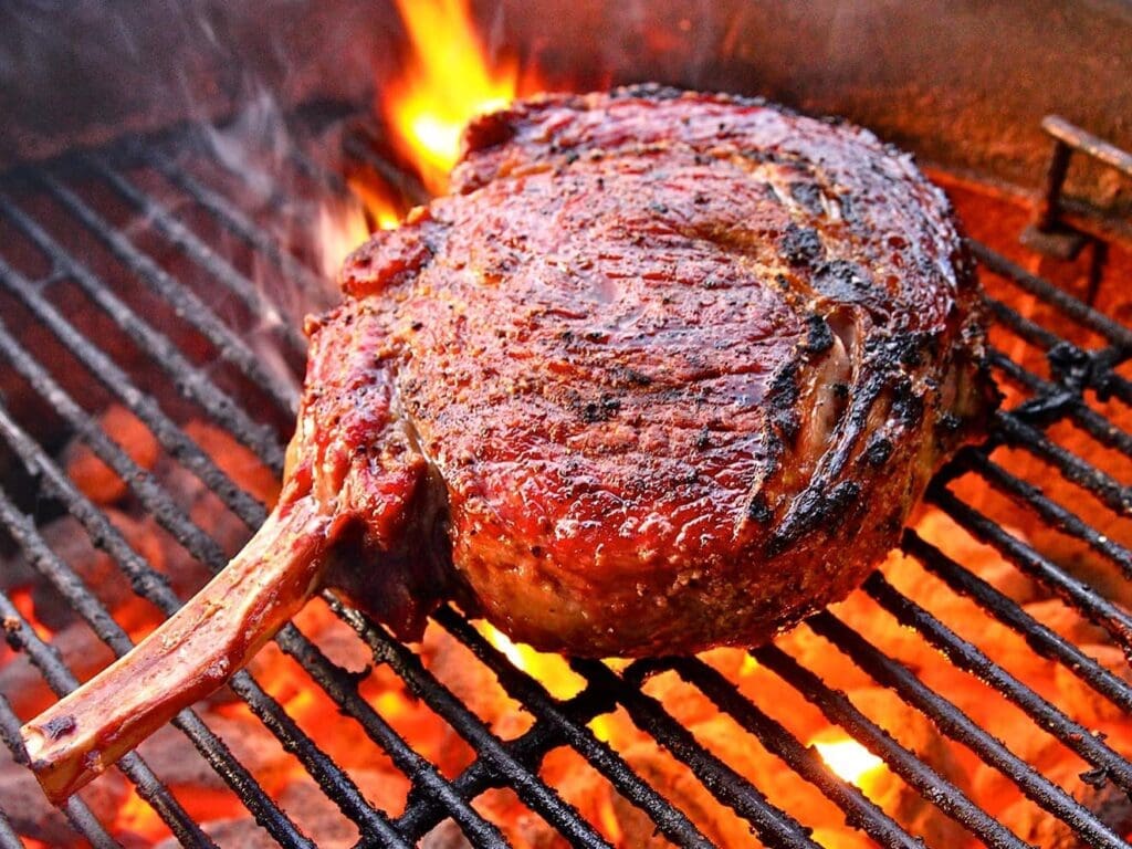 Behold the bone-in ribeye hot off the grill at Cattleman's Steak House.