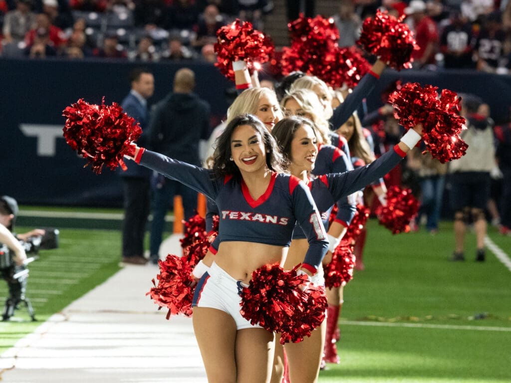 Houston Texans cheerleaders know it's good to be pulling for the Texans again. (Photo by F. Carter Smith)