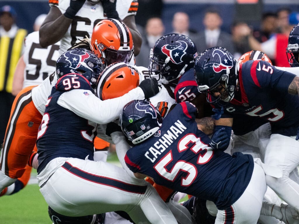 This Houston Texans defense plays — and tackles — toogether. (Photo by F. Carter Smith)