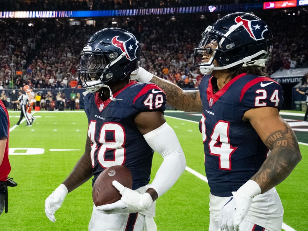 Houston Texans defenders Christian Harris and Derek Stingley Jr. know it's best to celebrate together. (Photo by F. Carter Smith)