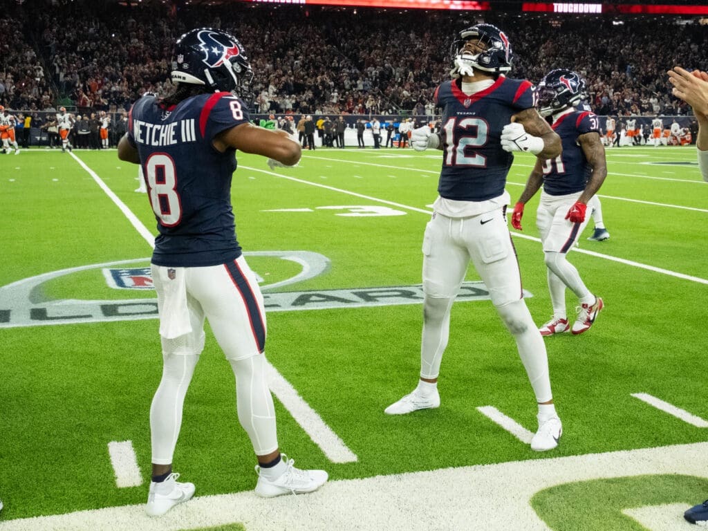 Houston Texans receivers  John Metchie III and Nico Collins know how to celebrate a moment. (Photo by F. Carter Smith)