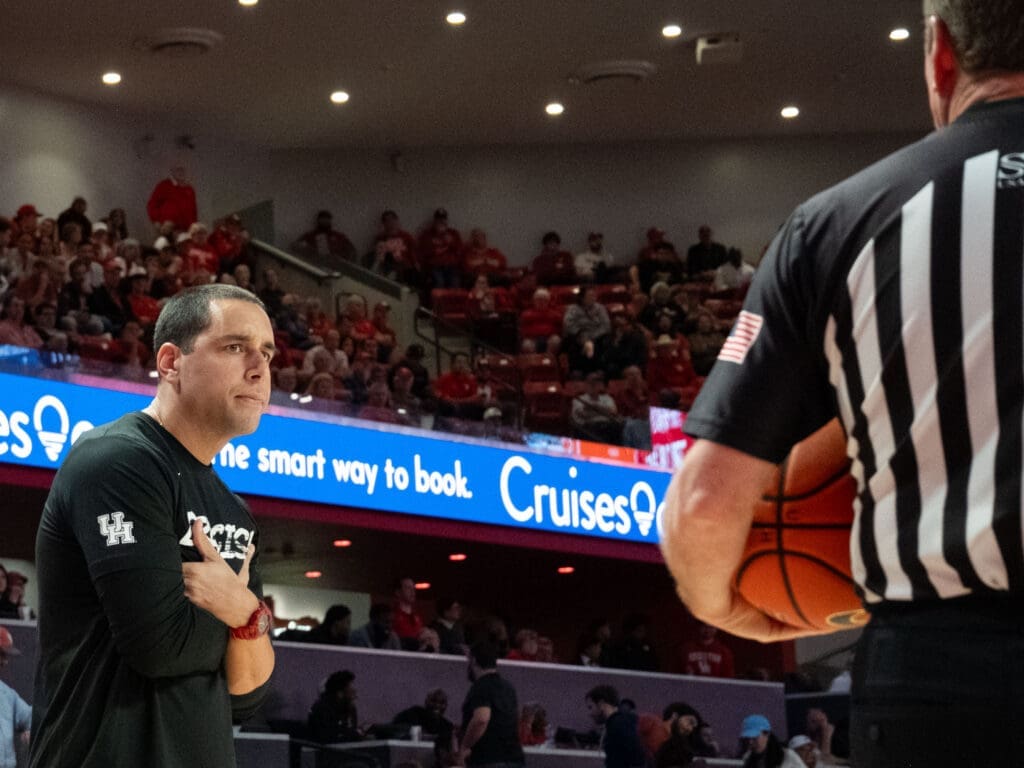 UH assistant coach Kellen Sampson took over for his dad on the sidelines and gave the refs some messages of his own. (Photo by F. Carter Smith)